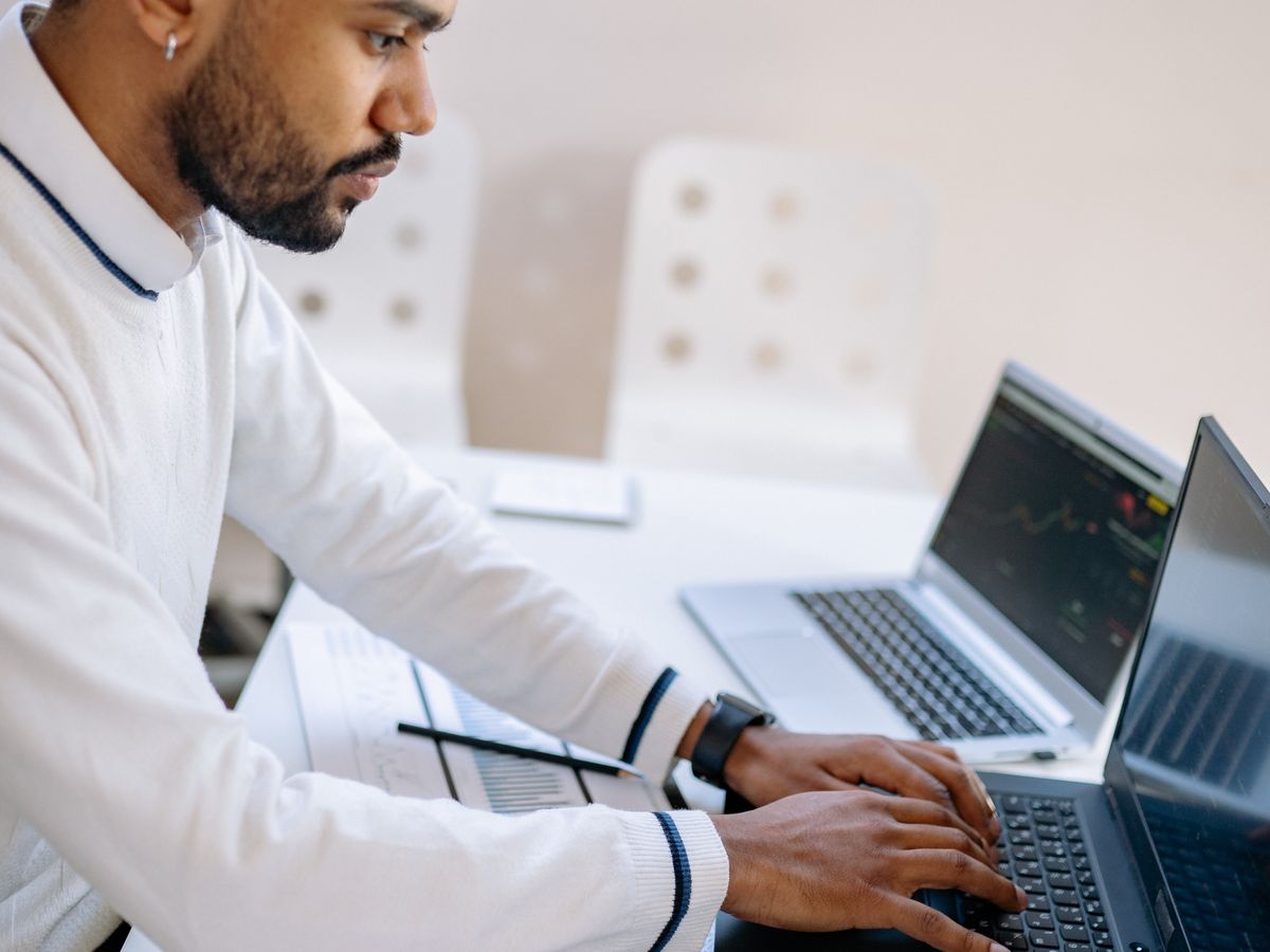 An ecommerce team reviewing performance on a laptop