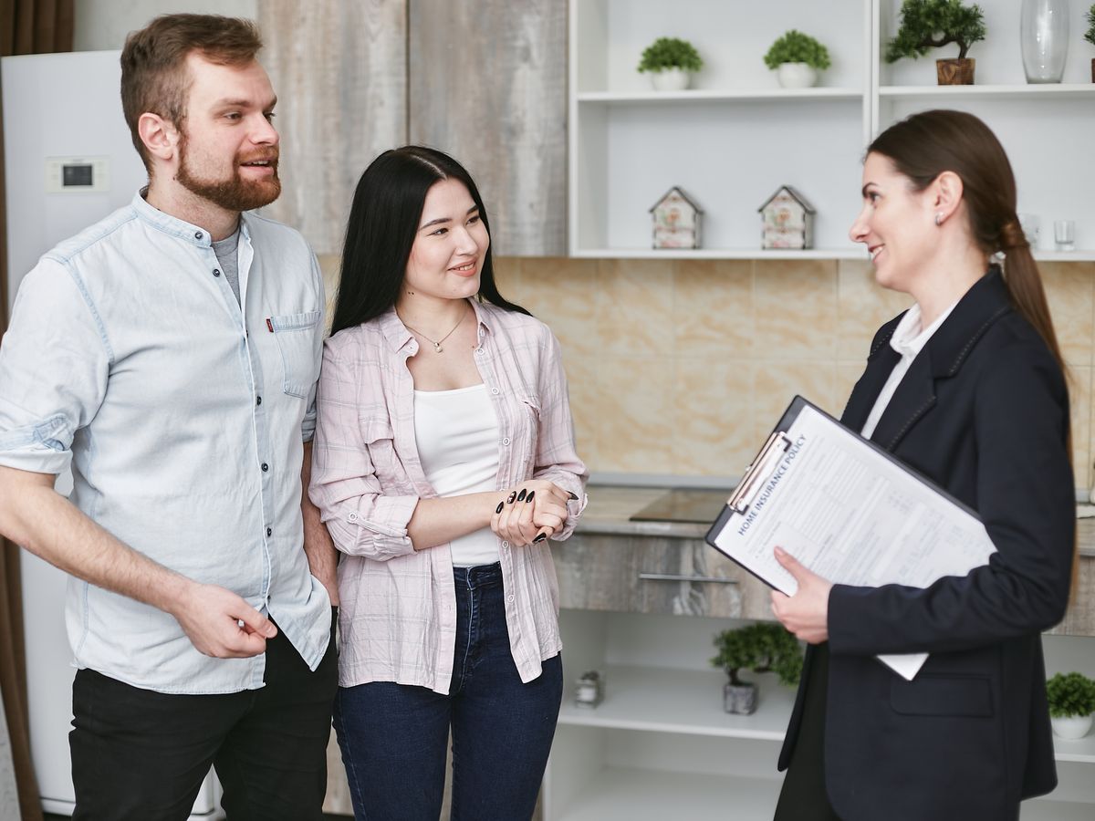 An agent reviewing results with clients